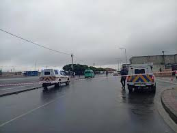 At the scene where two were killed and one is wounded in suspected taxi-related shooting at Delft rank